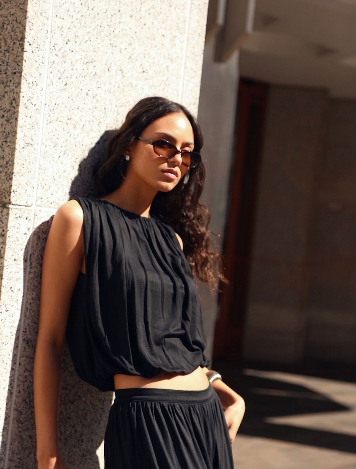 Koa Puff Ball Hem Top In Black
